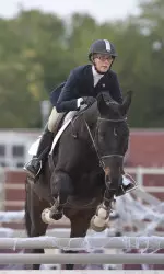 Senior Kimberly Hewson Budnik earned four MVP honors to lead the Bulldogs to a second place finish at The Willis Invitational.