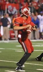 File: Derek Carr completed 23 of 39 passes for 248 yards and two touchdowns. He also ran for a score.