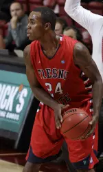 (AP) Kevin Foster looks to pass in the first half.