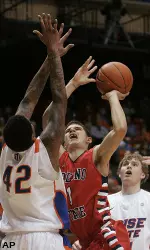 Tyler Johnson (1) shoots over Boise State's Kenny Buckner (42).