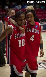 Seniors Marnique Arnold (left) and Jaleesa Ross (right) head off the court together after Fresno State's 82-68 loss to North Carolina.
