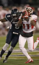 Rashad Evans catches the ball against Nevada's Duke Williams. (AP Photo/Cathleen Allison)