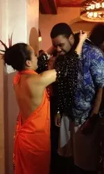 The `Dogs received kuiku nut necklaces upon entering the Royal Hawaiian Lu'au.