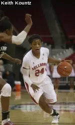 Sophomore Ki-Ki Moore recorded her sixth double-double of the season with 23 points and 11 rebounds.