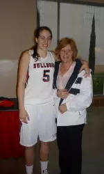 Sophomore Bree Farley and her mother Julie after a basketball game at the Save Mart Center.