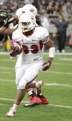 Running back Marteze Waller (33)