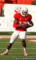 Davante Adams (15) runs with the ball after making a catch