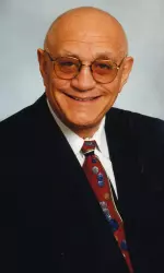Jerry Tarkanian both coached (1995-2002) and played (1954-55) at Fresno State.