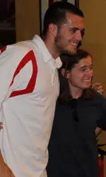 Derek Carr poses for a picture with a fan in Bakersfield