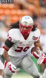 Josh Quezada runs against the Rice defense.