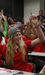 Freshman Emilie Volk reacts and celebrates with her teammates upon seeing Fresno State's name on the ESPN Selection Show