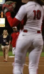 Joe Ortiz's brother Dwayne threw out the ceremonial first pitch to Brooke Ortiz with team manager and sister Halle looking on a week after Joe had passed away after experiencing a blood clot in his brain.