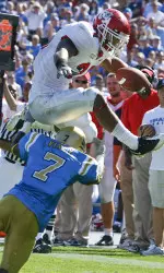 RB Ryan Mathews leaps over a UCLA defender during Fresno State's 2008 victory over the Bruins in the Rose Bowl