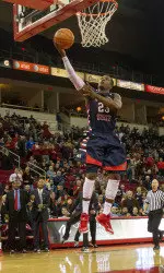 Junior Marvelle Harris has averaged 22.8 points per game in true road games this season.
