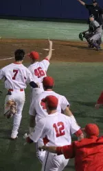 The Bulldogs storm out from the dugout to celebrate walk-off win