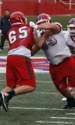 Redshirt freshman Ben Simonds and sophomore Ryan Steele battle up front at the line of scrimmage