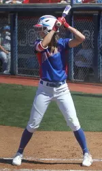 Brenna Moss guides the team posting four hits in seven at-bats against Utah State.