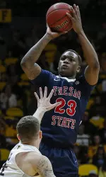 Marvelle Harris scored 25 points with a career-high seven 3-pointers in the Bulldogs' 79-75 road win at Wyoming on Wednesday night.