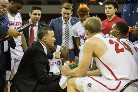 Justin Hutson coaching in the huddle