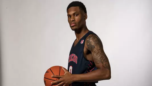 New Williams staged action shot in navy uniform