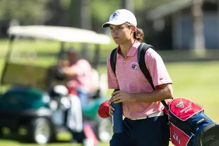 Michael Cliff walking up the fairway