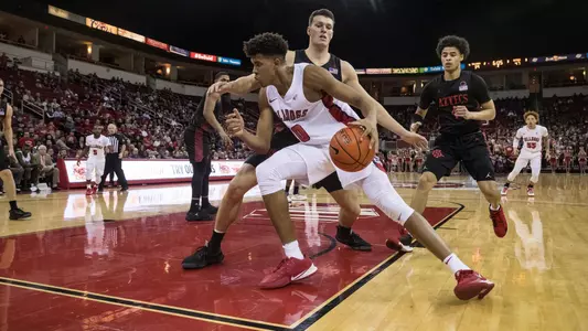 Orlando Robinson driving to the basket on SDSU