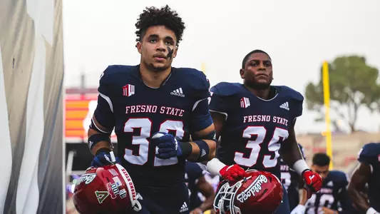 Evan Williams and Malachi Langley head up the ramp before kickoff