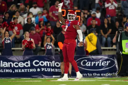 Oct 23, 2021; Fresno, California, USA; Fresno State Bulldogs defensive end Arron Mosby (3) celebrates after recording a sack against the Nevada Wolf Pack in the fourth quarter.