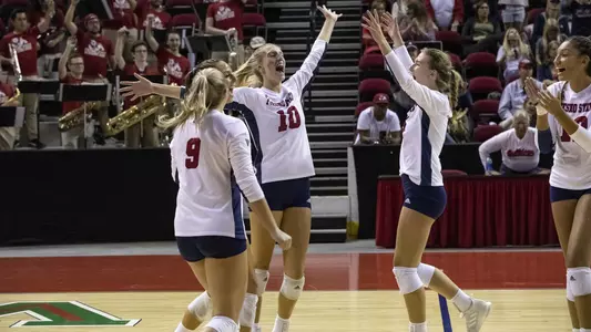 'Dogs celebrate a point vs. Nevada