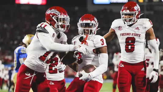 Erik Brooks celebrates his first career touchdown