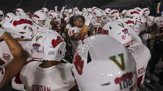LB Tyson Maeva pumps up the team before the game