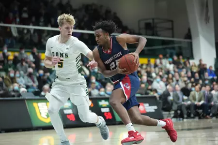 Anthony Holland, driving to basket, at USF, low res