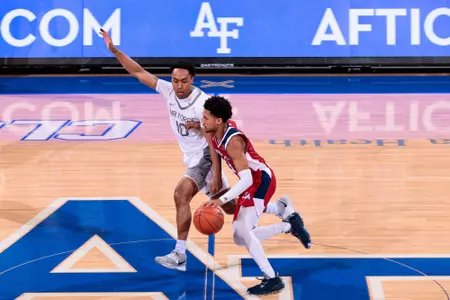 NCAA Basketball: Fresno State at Air Force (Isaiah Hill driving at mid-court)