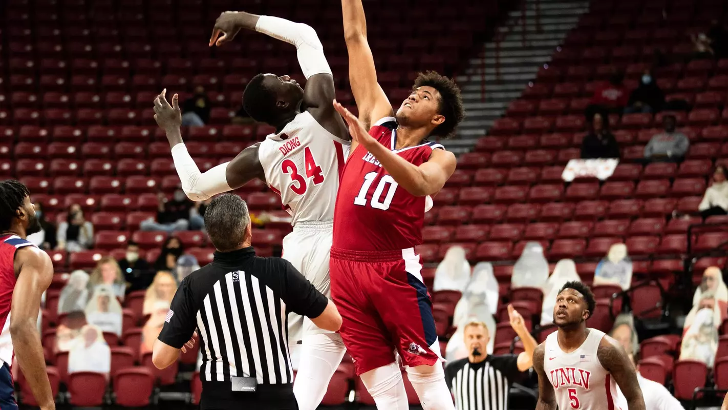 Orlando Robinson, opening tip off, at UNLV