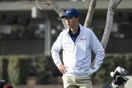 Tommy Stephenson, hands on hips, standing