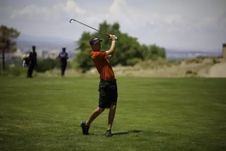 Tommy Stephenson, follow through, iron from rough, red polo, NCAA Regional