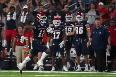 Sep 24, 2021; Fresno, California, USA; Fresno State Bulldogs wide receiver Josh Kelly (11) runs with the ball after making a catch against the UNLV Rebels in the second quarter.