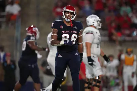 Sep 24, 2021; Fresno, California, USA; Fresno State Bulldogs defensive end David Perales (99) reacts after the Bulldogs made a defensive stop on third down against the UNLV Rebels in the second quarter.