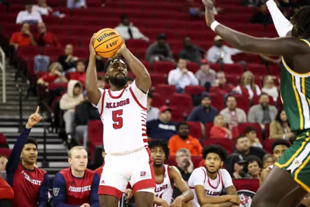 Jordan Campbell, 3-pointer, bench in background