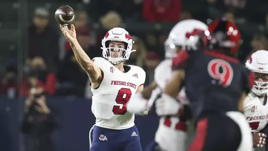 Fresno State quarterback Jake Haener throws the ball to his receiver in game at San Diego State