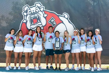 Team with 2022 MW trophy in grey championship t-shirts
