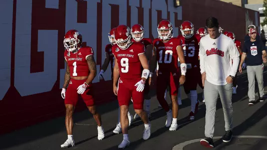 Fresno State Football team comes out for game warmpus