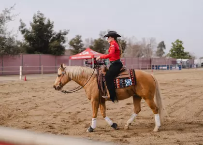 Sarah Semrau competes in the reining event