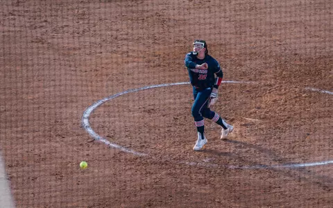 Taylor Gilmore, pitching, navy uniform