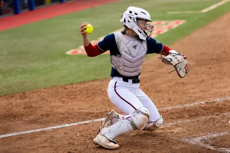 Kennedy Bunker, catcher, ball in right hand