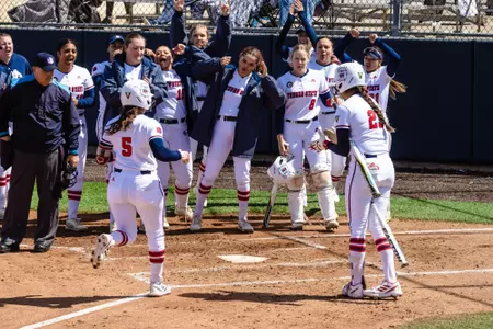 Denby, home run celebration with team