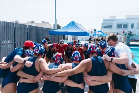 Fresno State water polo team huddle