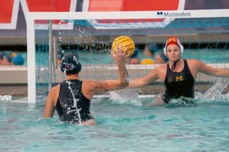 Hailey Andress shoots a 5-meter penalty shot against Michigan