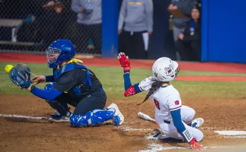 Emma Martinez sliding home