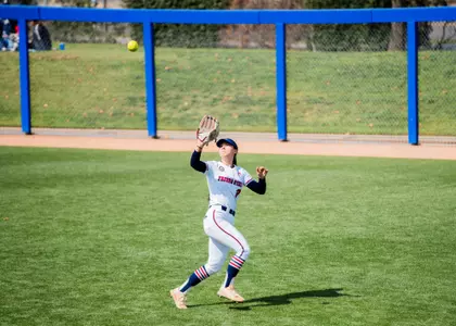Natalie Elias catching a fly ball